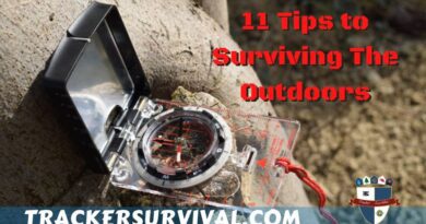 11 Tips to Surviving in the Outdoors. A Suunto Compass laying on a tree stump, with the words ''11 Tips to Surviving in the Outdoors'' in bright red