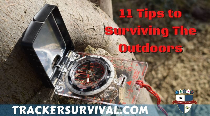 11 Tips to Surviving in the Outdoors. A Suunto Compass laying on a tree stump, with the words ''11 Tips to Surviving in the Outdoors'' in bright red