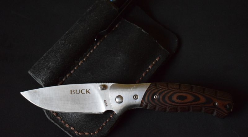 Buck Selkirk folder with a homemade leather pocket organizer